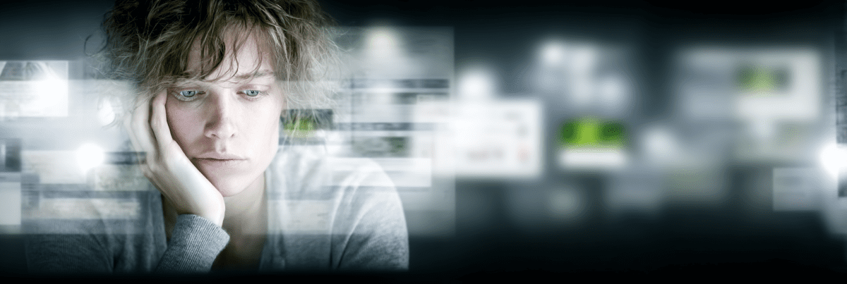 A tired person staring blankly ahead while surrounded by blurred floating digital screens and streams of online information, conveying emotional exhaustion from constant technology and AI updates.