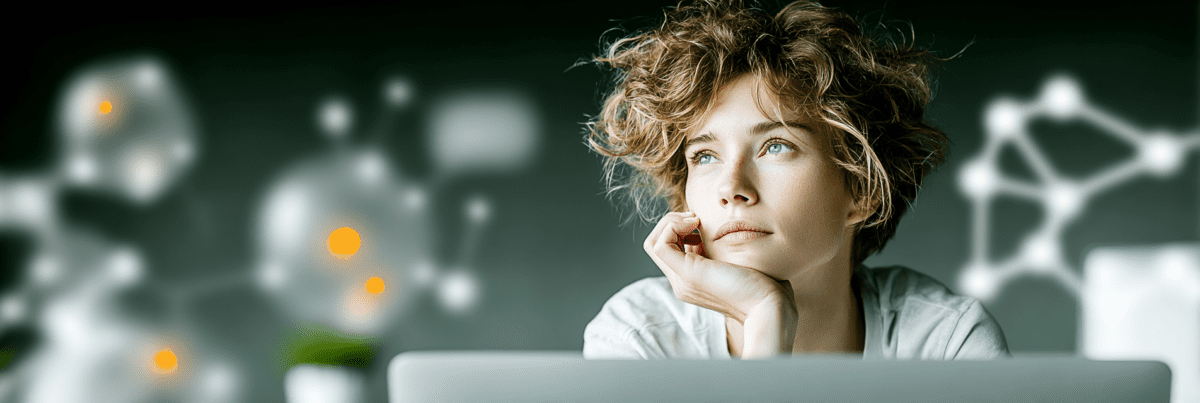 A thoughtful person sits behind a laptop, looking into the distance while abstract connected shapes glow softly in the background, symbolizing reflection, learning, and human engagement with emerging technologies.